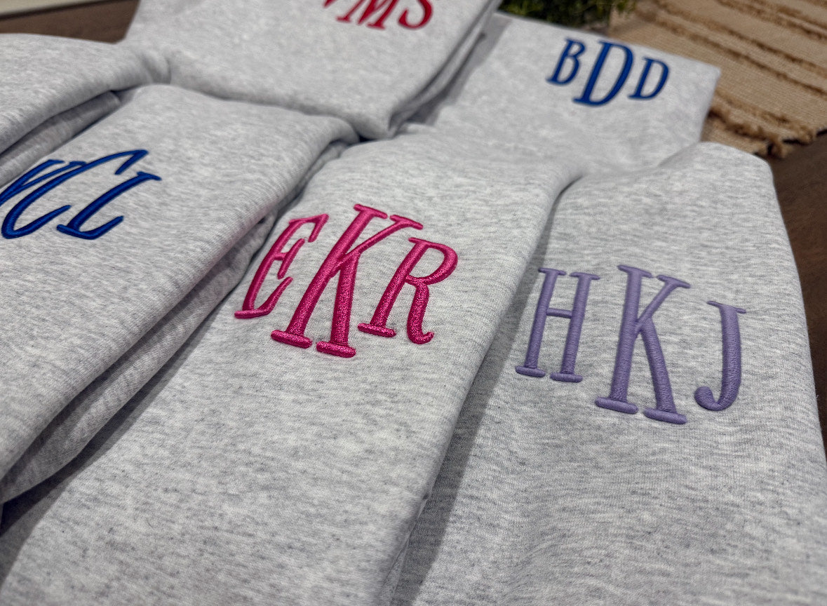 Puff Pocket Initial Sweatshirts